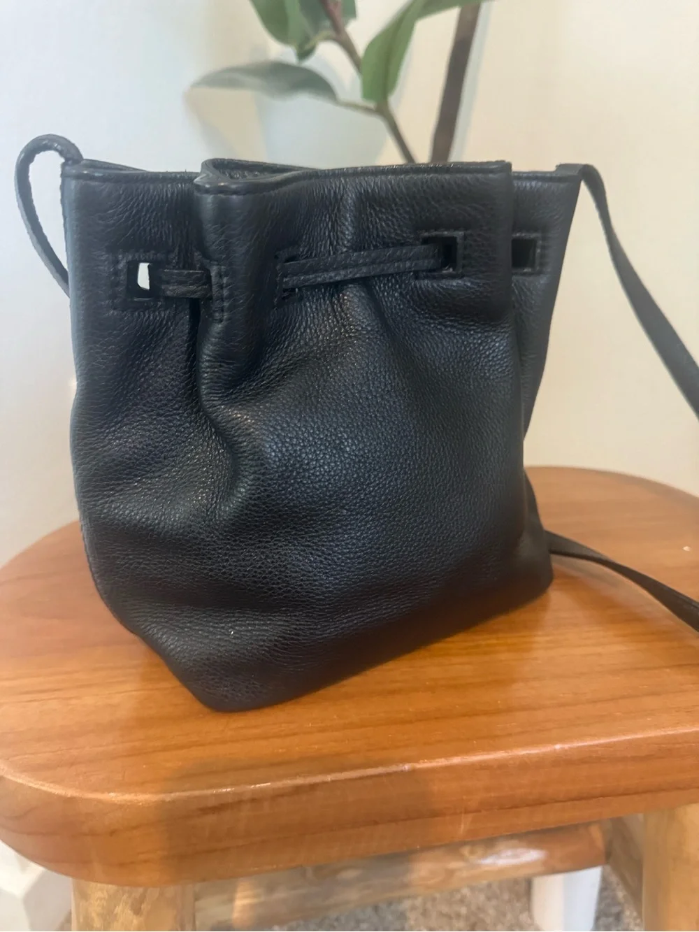 kate spade black pebbled leather tassel drawstring crossbody bag